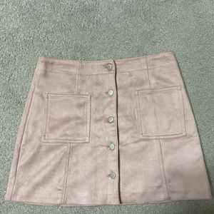 Pink faux suede button front mini skirt